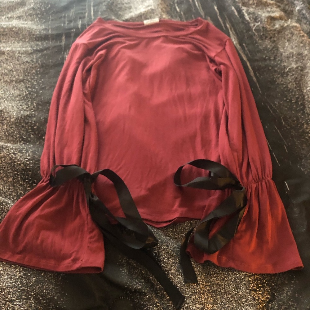 Long bell sleeve